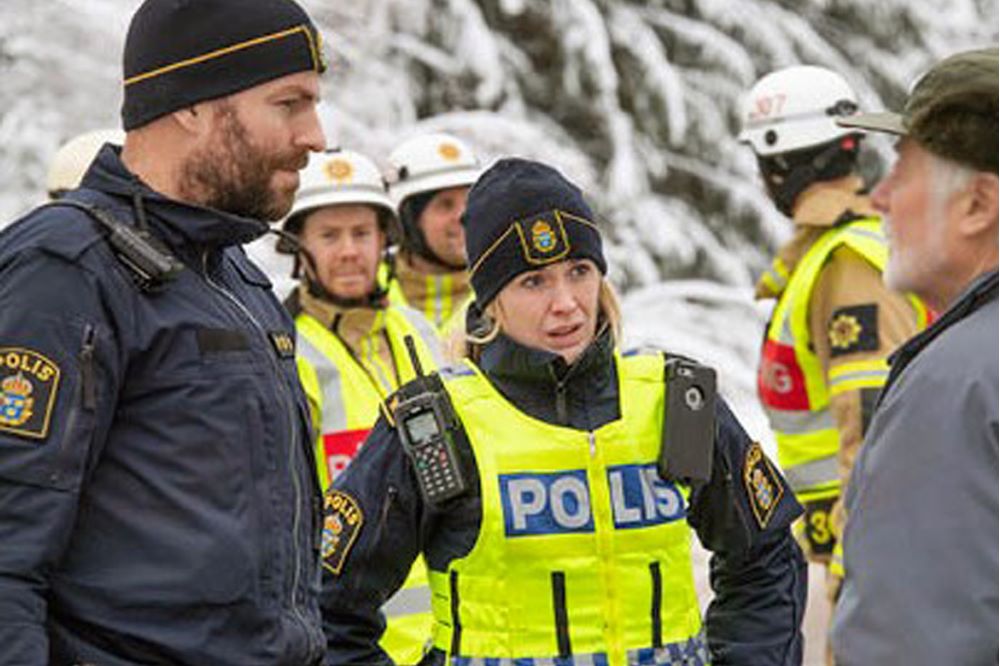 Poliser och räddningstjänst står vi en olycksplats.