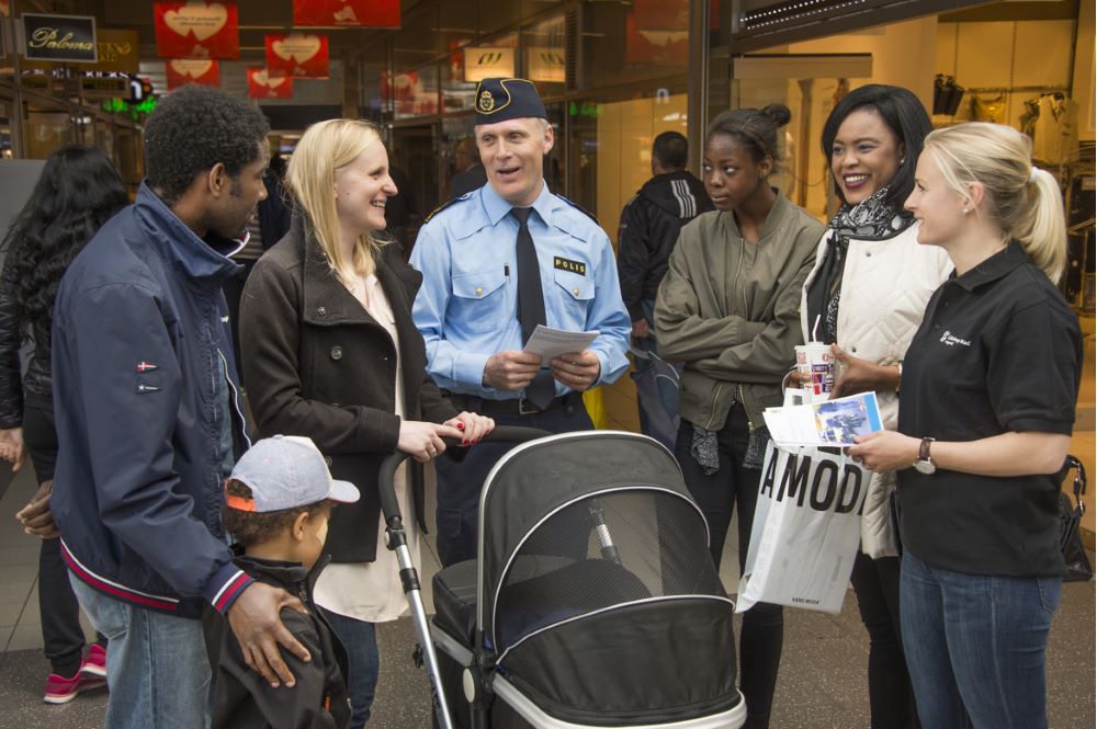 Policeman talking with citizen